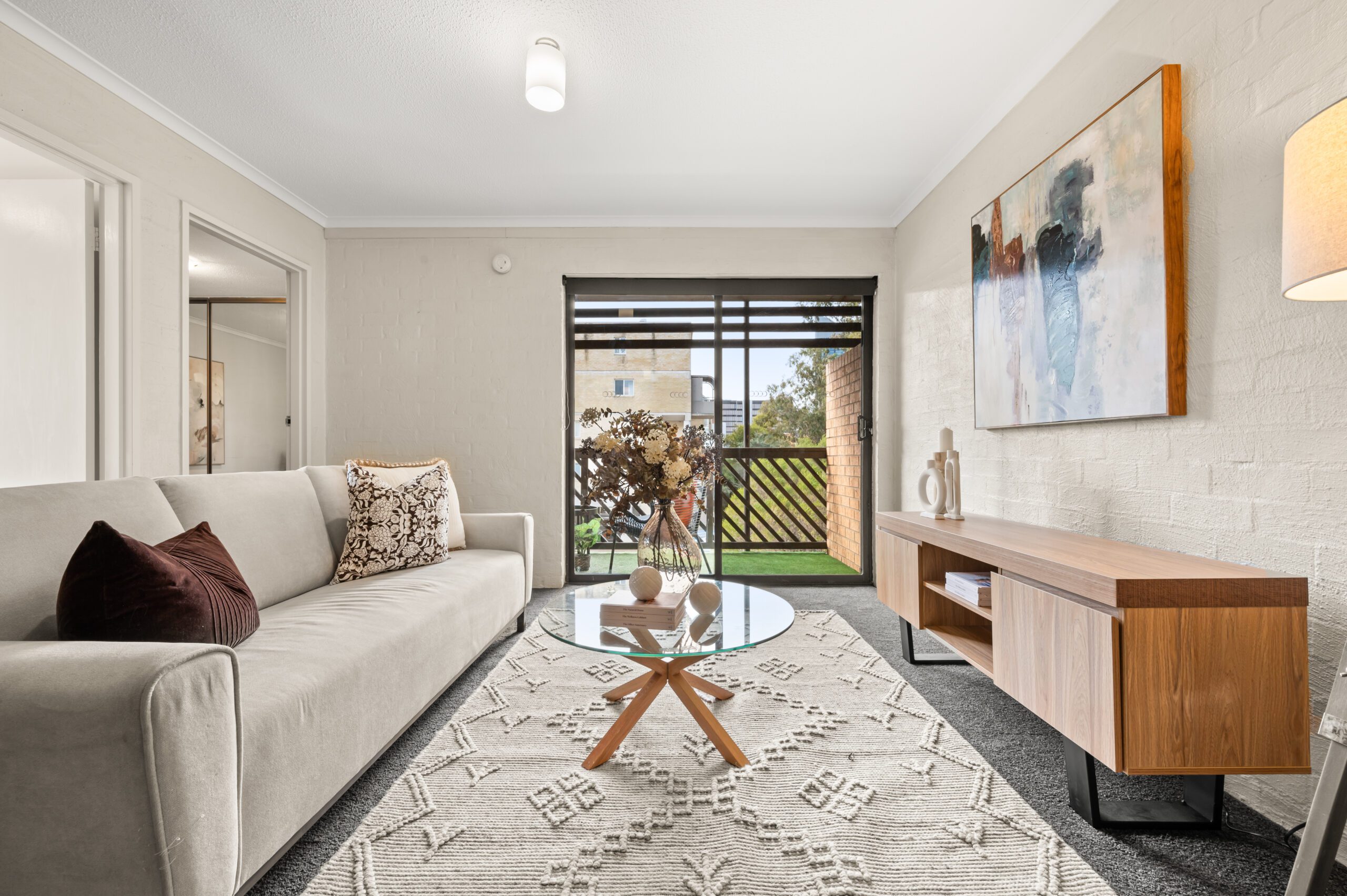 Spacious and stylish living room interior at 2/36 Larakia Street in Waramanga, showcasing Canberra’s vibrant summer property market.